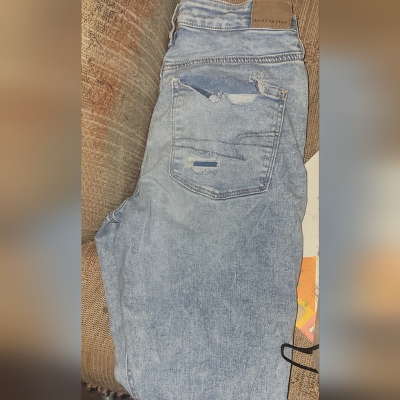 American Eagle Outfitters Destroyed Light Acid Wash Super Stretchy Jeans - Picture 13 of 15